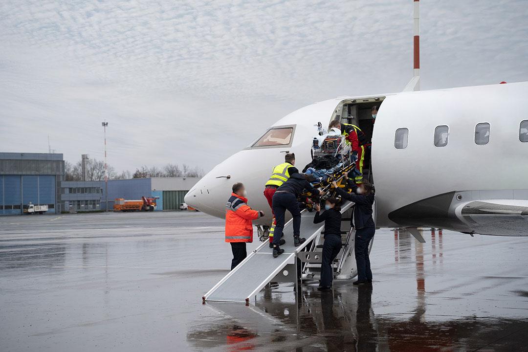 Flight medic crew take the patient on board